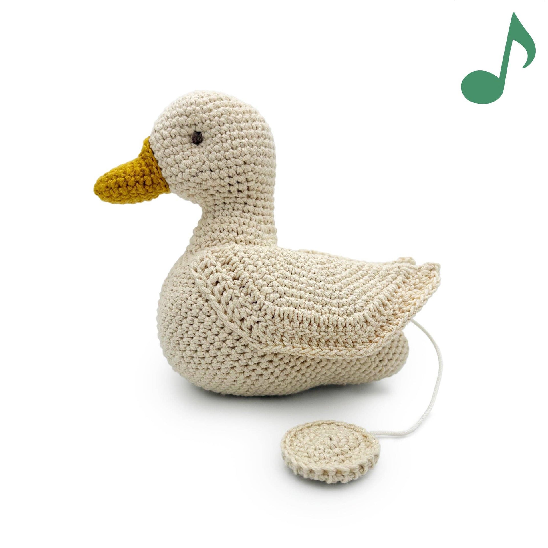 Peluche in maglia Papera musicale