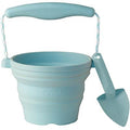 Scrunch: MINI SEAU PLIABLE avec PELLE oeuf de canard bleu 14x12,5x3cm, avec anses en corde, repliable, 100% silicone, recyclable, 12m+