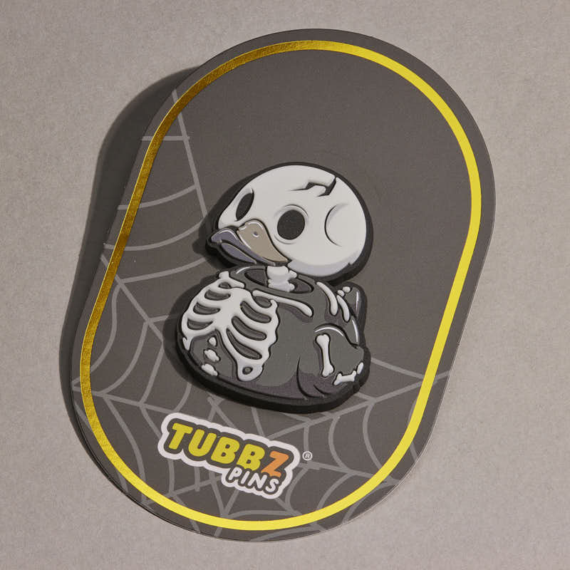 Pin's TUBBZ Numskull – Squelette phosphorescent