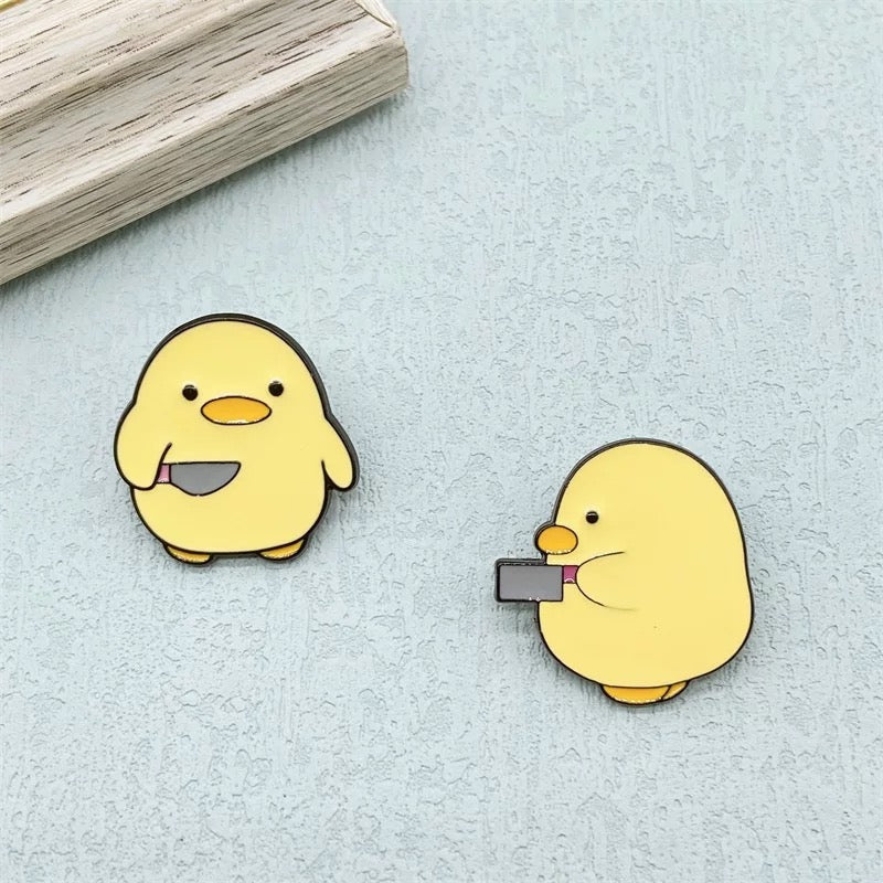 Pins Canard Jaune Couteau