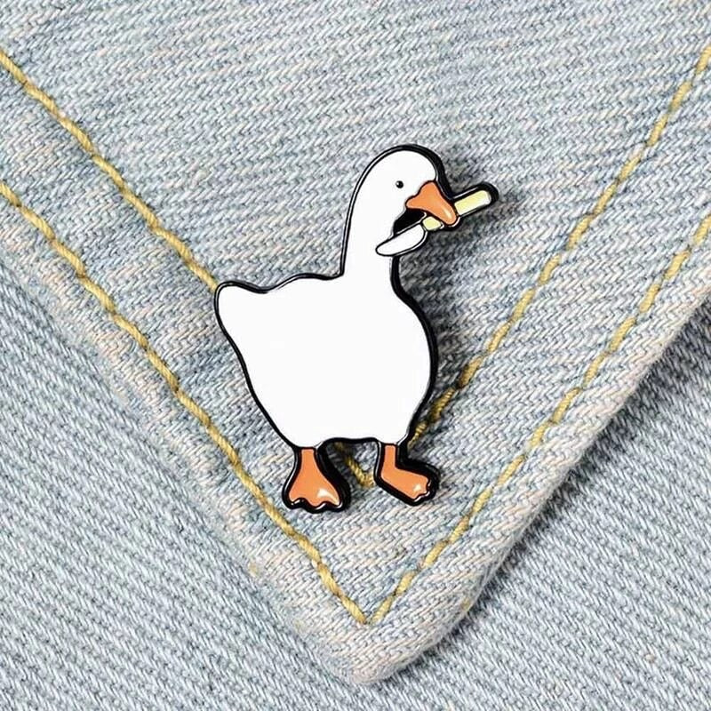 Pin's Canard Blanc Couteau