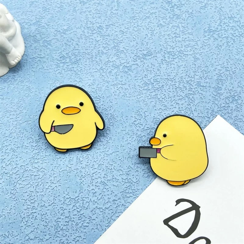Pins Canard Jaune Couteau
