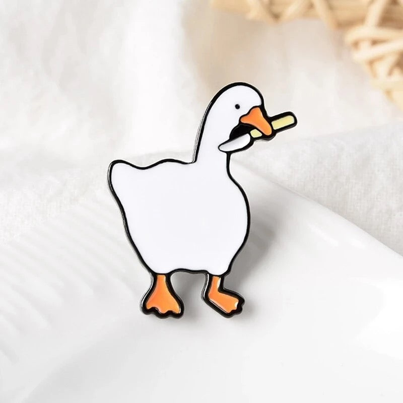 Pin's Canard Blanc Couteau